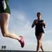 Saline and Huron runners on Tuesday, April 30. Daniel Brenner I AnnArbor.com
